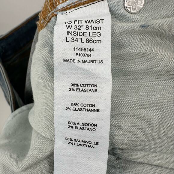 ASOS DESIGN skinny jeans in tinted mid wash with knee rips Size 32x34 - Picture 6 of 8